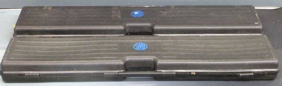 Two RWS rifle hard carry cases with padded interiors, 124x26x11cm.