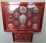 Thirteen metal badges including Mine Clearance Service, Royal Scots, Lincolnshire Yeomanry etc, in