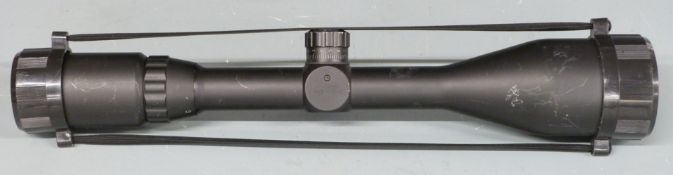 AGS 3-9x50 Mil-Dot rifle scope with scope covers.
