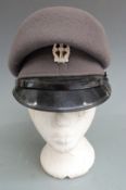 Royal Air Force cap and side hat with a bullion wire badge, RARANC hat, St John's cap and one other
