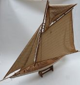 A fully rigged wooden model pond yacht, L105 x H105