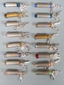 Sixteen novelty keyrings mounted with revolver charms and made with spent cartridge cases.