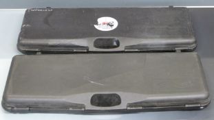 Two Waltham shotgun hard carry cases both with padded interiors, 84x32x9cm. .