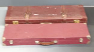 Two shotgun carry cases both with fitted interiors one with a section for a second set of barrels,