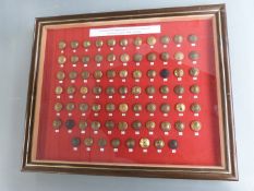Seventy-four WW1 British Army tunic buttons representing the Guards and Infantry Line Regiments