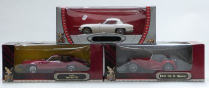 Three Road Signature 1:18 scale diecast model vehicles comprising two Deluxe Edition 1947 MG TC