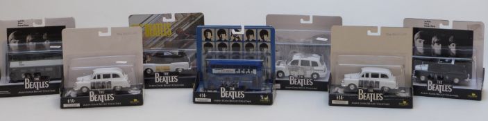 Seven Factory The Beatles Album Cover diecast model vehicles, all in original display boxes.
