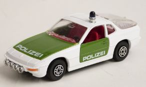 Corgi Toys diecast model Porsche 924 police car with white and green body and red interior, 430,