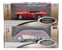 Two ERTL Grandes Marques 1:18 scale diecast model cars Austin-Healey 100/6 33838 and Triumph TR6