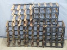Five wine racks, would accommodate 57 bottles, largest 43 x 42cm