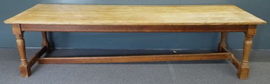 Arts and Crafts oak three plank refectory table raised on four turned legs united by two straight