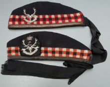 Two British Seaforth Highlanders Glengarry hats, officer's three piece badge and an other ranks