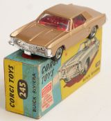 Corgi Toys diecast model Buick Riviera with gold body, red interior and spoked hubs, 245, in