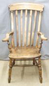 A 19thC elm seated Windsor armchair, H1005cm x W62cm