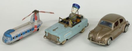Three Japanese battery operated model toys comprising Bandai Volkswagen Sedan, 'Rendorseg' police