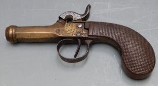 Belgian brass percussion hammer action pocket pistol with engraved lock and trigger guard, chequered