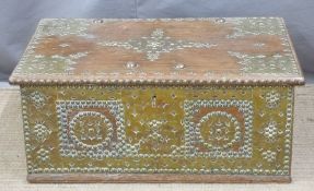 Eastern twin handled trunk with riveted brass decoration and fitted interior, W57 x D37 x H25cm