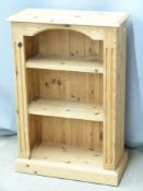 A contemporary pine bookcase, W61 x D27 x H92cm