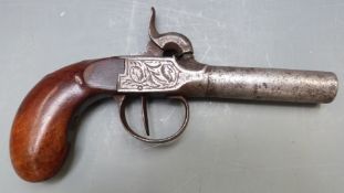 Belgian brass percussion hammer action gun with engraved lock and trigger guard, shaped wooden