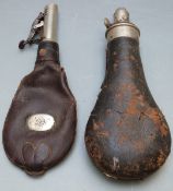 Sykes leather covered metal powder flask together with a leather shot flask, largest 21cm long.