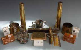 Two brass shells dated 1944 together with two 5.7