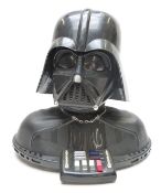 Four Star Wars wristwatches including two Collector Timepiece with Millennium Falcon cases all in