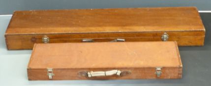 Two wooden shotgun or rifle hard carry cases, 115x29x11.5cm and 80x25x8cm.