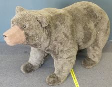 A life size freestanding Teddy bear, 220cm long.