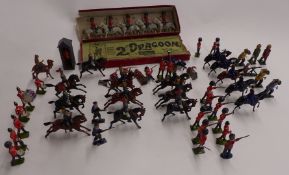 Fifty-four Britains and similar lead model soldiers including 2nd Dragoons, Highlanders, cavalry,