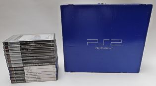 Sony Playstation 2 (PS2) video games console and 12 games including Tekken, Fifa, God of War,