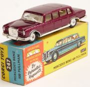 Corgi Toys diecast model Mercedes Benz 600 Pullman with maroon body, cream interior and operating