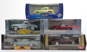 Five 1:18 scale diecast model vehicles comprising Revell Austin-Healey Sprite, Sun Star 1966 Lotus