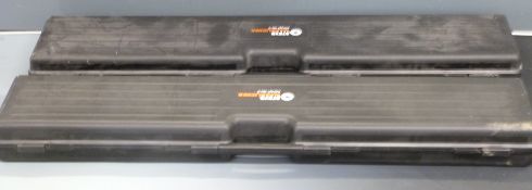 Two Steyr rifle hard carry cases with padded interiors, 123x26x11cm.