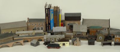 A collection of Hornby and Tri-ang 00 gauge model railway buildings and accessories including
