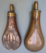 Two copper and brass powder flasks one G & J W Hawksley the other with embossed acanthus leaf