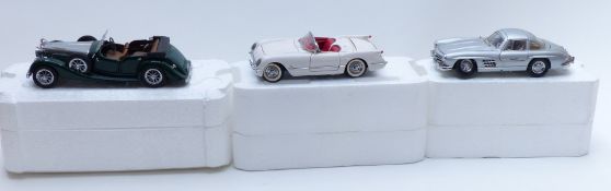 Three Franklin Mint 1:24 scale diecast model vehicles 1954 Mercedes-Benz 300SL, 1936 Alvis 4.3 Litre