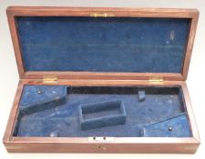 Mahogany fitted gun case with felt lined interior and two lidded compartments to suit a pair of