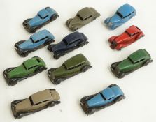 Eleven Dinky Toys diecast model cars including Triumph, Riley, Bentley etc, some pre-war.