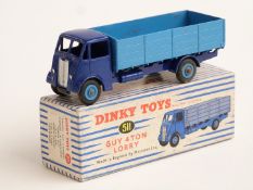 Dinky Toys diecast model Guy 4-Ton Lorry with dark blue body and chassis and light blue bed and