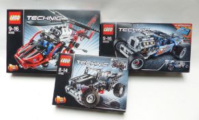 Three Lego Technic building sets Rescue Helicopter 8068 (2011), Hot Rod 42022 (2014) and Off-