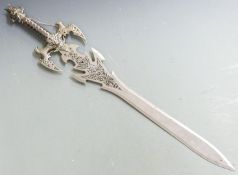 A large steel bladed fantasy sword with eagle decoration and 65cm etched and shaped blade, overall