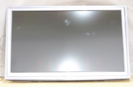 Panasonic TX-L42D25BA LCD flatscreen television with remote control and instructions, W105 x 64cm