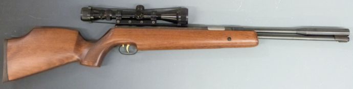 Weihrauch HW97K .22 air rifle with chequered semi-pistol grip, raised cheek piece, adjustable gilt