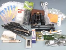 A collection of shooting and gun accessories including Beretta and Musto recoil reducers,