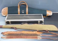 A shotgun flight case (83x29x13cm) together with two padded gun/ rifle slips including one BSA,