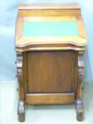 A mahogany Davenport with fitted interior and four graduated drawers, W53 x D52 x H83cm