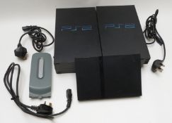 Three Playstation 2 video games consoles including one slimline PS2 together with 37 various PS2 PS3
