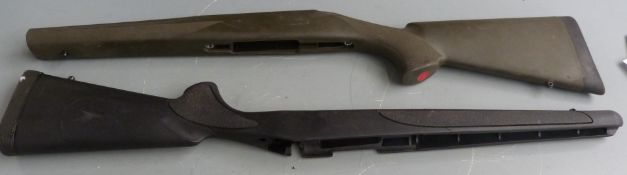 Two synthetic bolt action rifle stocks one Howa (79cm long) the other Remington, 78cm long
