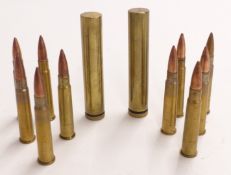 Two Enfield brass oil bottles, both with Ministry marks to bottom, together with ten .303 drill