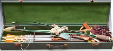 A vintage archery set in fitted case including an Apollo Falcon bow